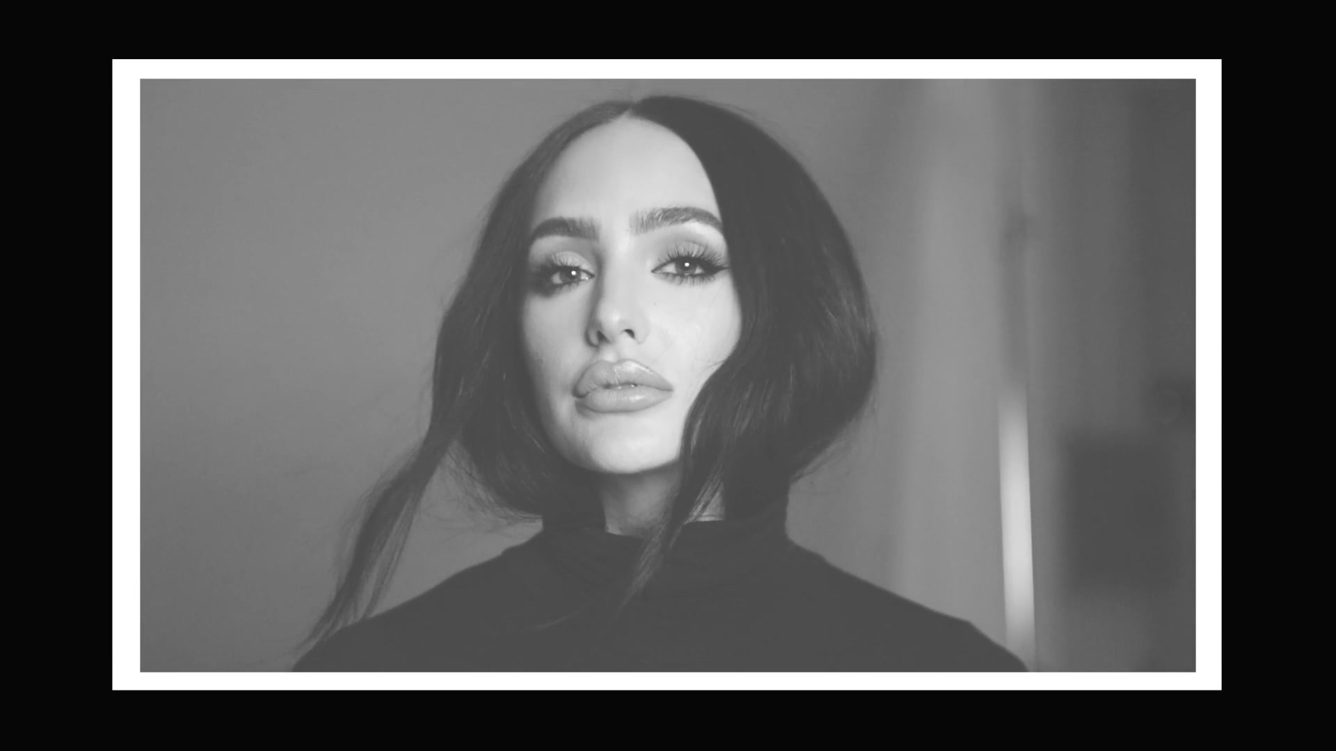 Ash K Holm, portrait